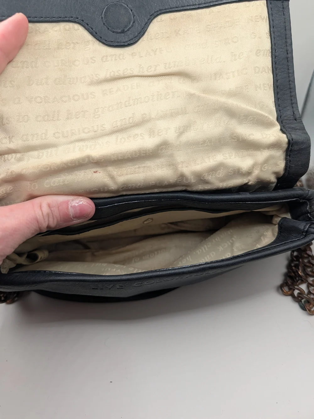 kate spade black leather crossbody with bronze chain